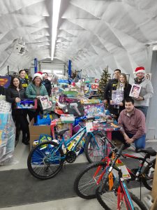 Warehouse containing people and donations